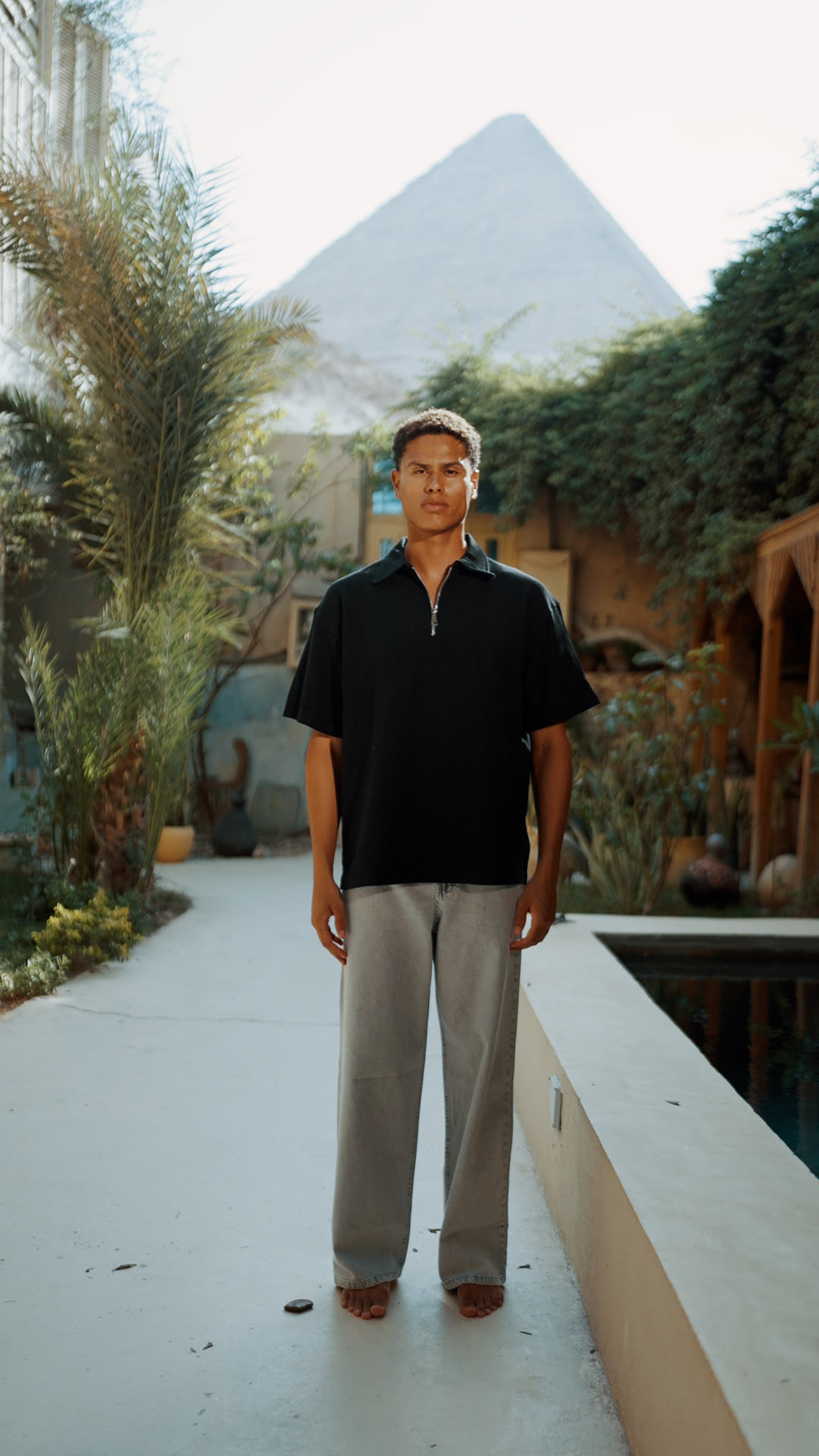 BLACK QUARTER ZIP POLO XC 500