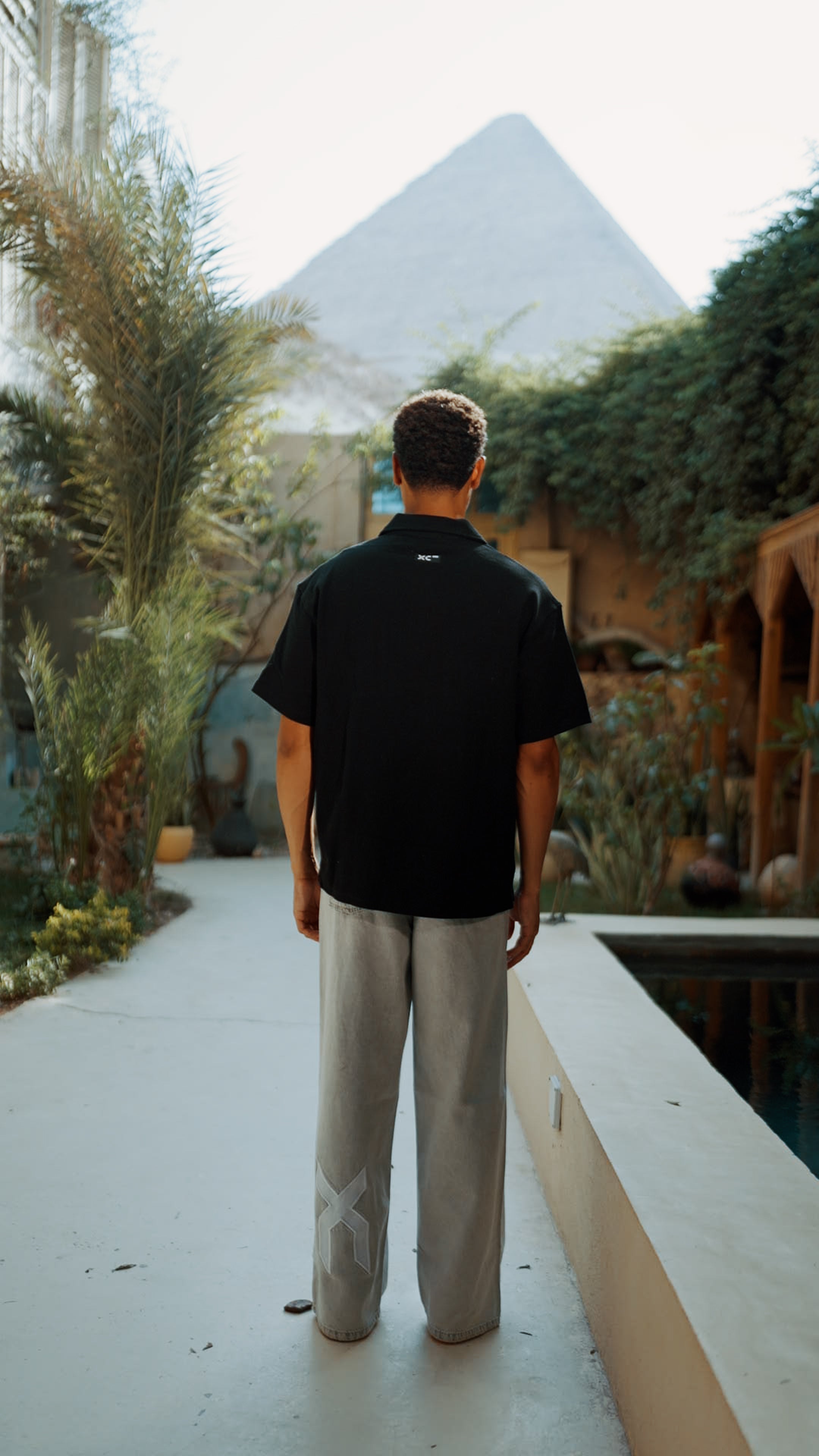 BLACK QUARTER ZIP POLO XC 500