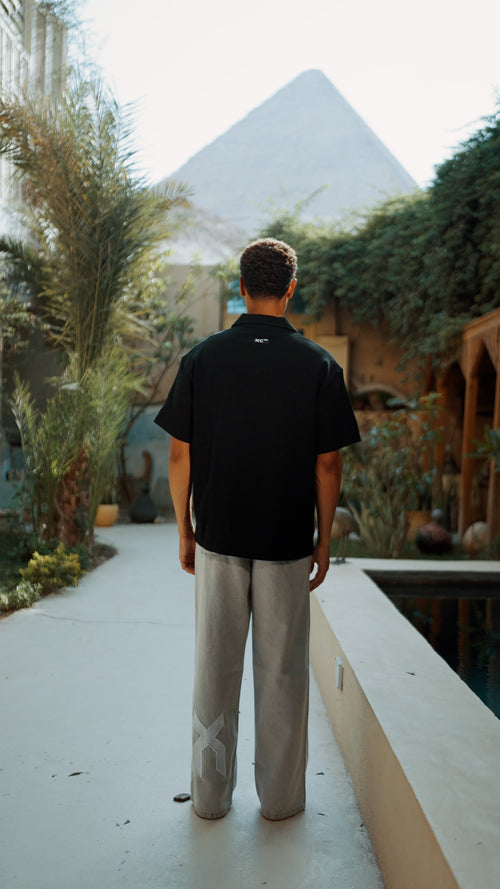 BLACK QUARTER ZIP POLO XC 500