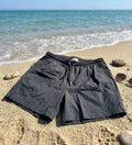 The XC Black Swim Shorts